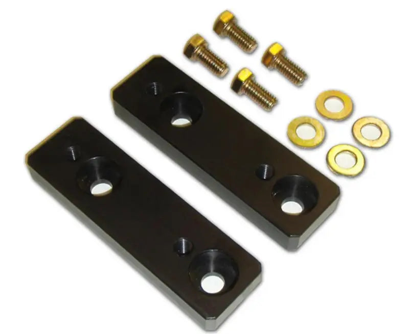 611030 Icon 05-Up Taco/07-09 Fj Swaybar Relocation Kit with bolts and washers, durable black brackets for enhancing vehicle performance.