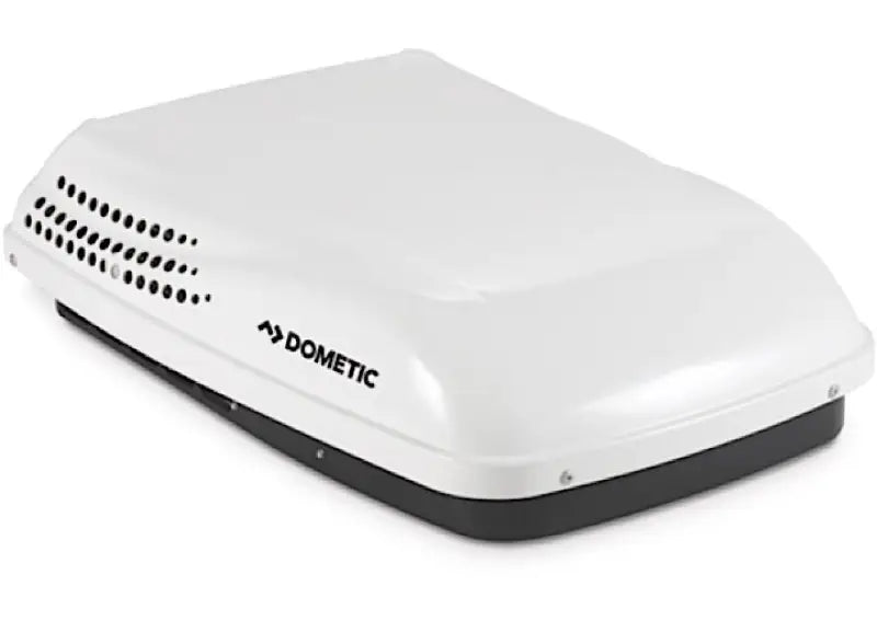 White Dometic Penguin rooftop air conditioner unit with ccc2 410a Wht for efficient cooling