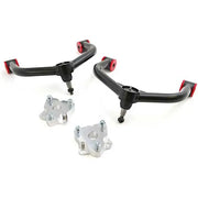 Black upper control arms with silver lift spacers for Ram 1500 leveling kit and better ground clearance