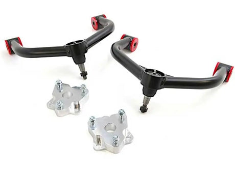Black upper control arms with silver lift spacers for Ram 1500 leveling kit and better ground clearance