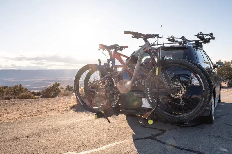 Swagman Okanagan bike rack holding two bikes securely on a car roof