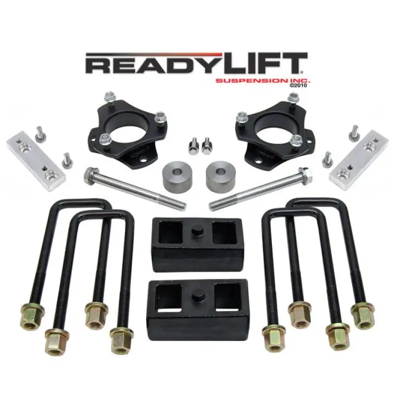 Readylift suspension lift kit components for 69-5212 Tacoma TRD, SR5, Rock W models with bolts, brackets, and spacers.