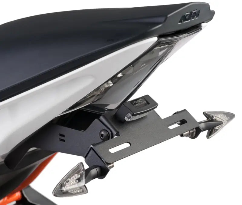 Black motorcycle fender eliminator kit with integrated LED turn signals for sleek look