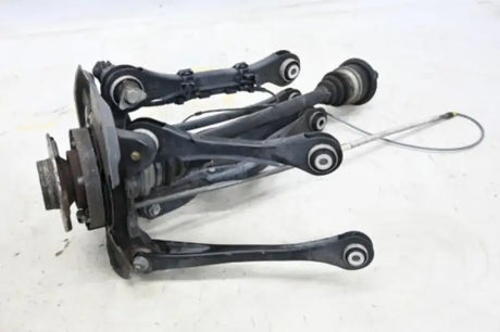 Black car suspension with Raybestos Wheel Hub Assembly LH for smooth wheel hub setup