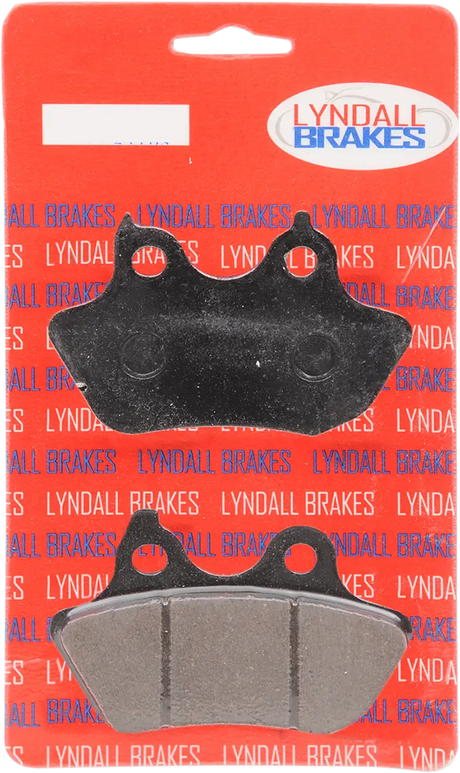 Black and gray Lyndall brakes brake pads with Gold+ for better stopping power on a red card