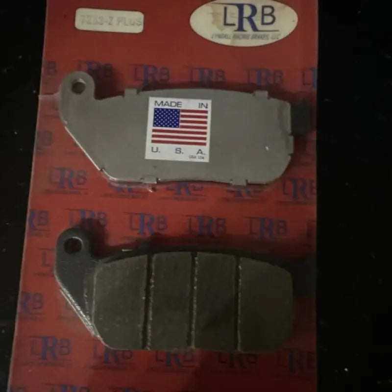 Two Lyndall Brakes extreme rear brake pads with US-made sticker and American flag