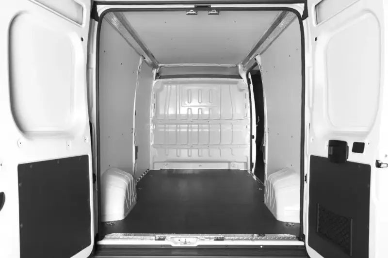 Open cargo van interior with Legend Fleet Duratherm wall liner for durability