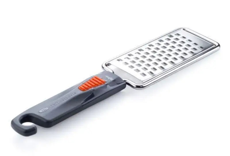 Gray and silver pack grater with orange accents from the G.S.I. Sports Pack Grater