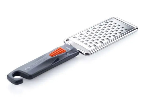 Gray and silver pack grater with orange accents from the G.S.I. Sports Pack Grater