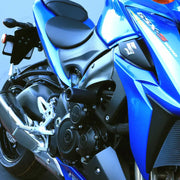 Blue Suzuki GSX-S 1000 motorcycle with black shogun frame sliders for protection