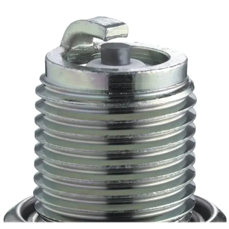 Close-up view of 7599 spark plug #7599/10 showcasing thread and electrode detailing for Shopify product.