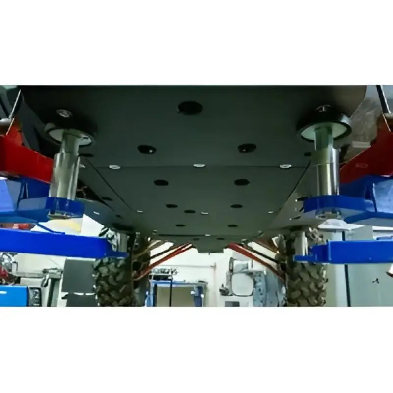 Heavy-duty metal skid plate with tree kickers for off-road vehicles, part of KIT Seizmik Skid