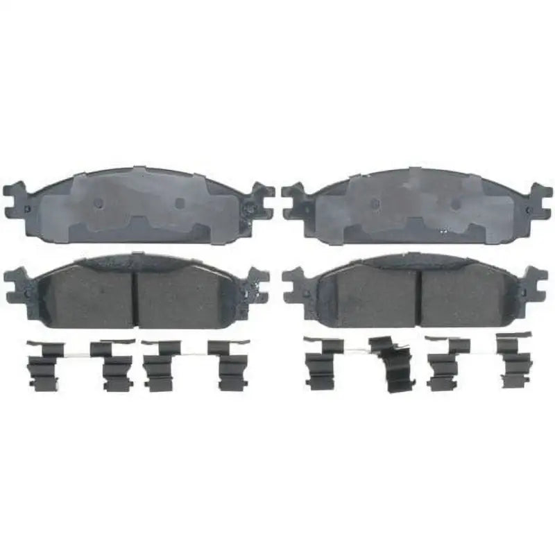 Four Raybestos Brake Rotr brake pads with clips for Dodge Ram 2WD vehicle
