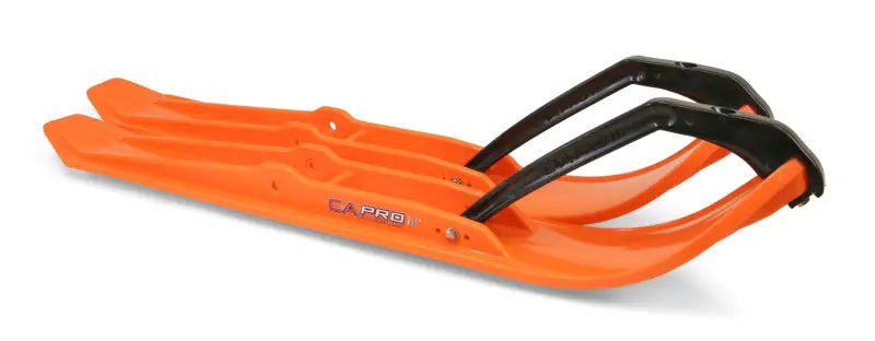 Orange Pro Xpt Skis with black handles for snowmobiling adventure