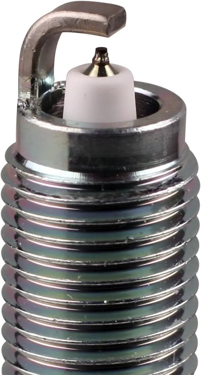 Shiny metal NGK ILZKR7B11 spark plug for optimal engine performance