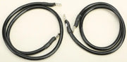 Two black electrical cables with metal terminals.