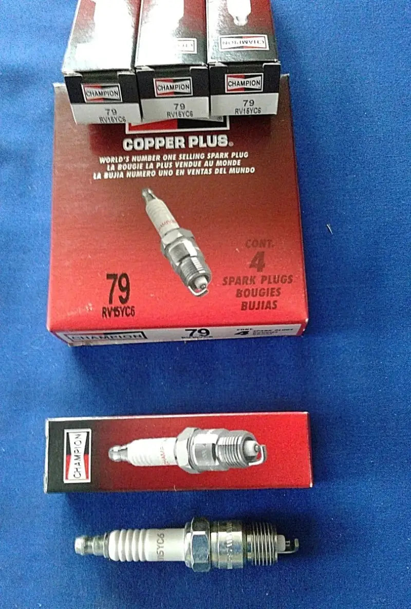 79 Champion Spark Plug, 4/Box - Premium ignition performance for enhanced fuel efficiency.