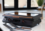 Cook indoors or outdoors with the 8001 Blackstone E-Series 22' Electric Tabletop Griddle's ceramic titanium surface.