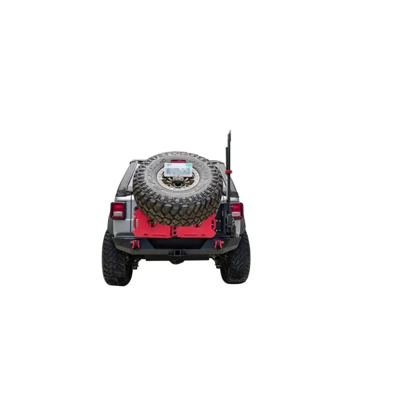 Rear view of a modified Jeep Wrangler JL Gen 3 with tire carrier for off-road adventures