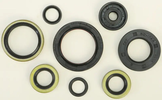 Black rubber oil seals with metallic and yellow rims in 822264 Oil Seal Set, seal kit