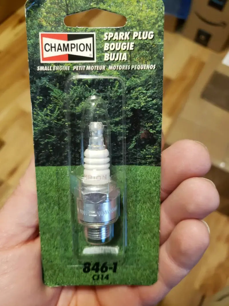 Champion small engine spark plug in packaging for small engine performance