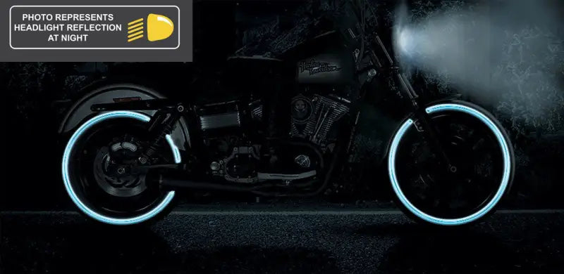 Reflective Shinko Tire 777 Cruiser HD Front illuminated by headlight, showcasing enhanced visibility at night on a cruiser motorcycle.