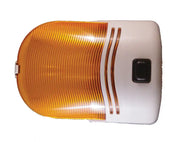 Orange and white light with square black button and grooved plastic cover.