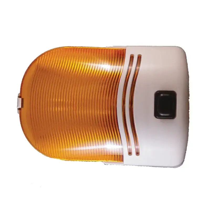 Orange and white light with square black button and grooved plastic cover.