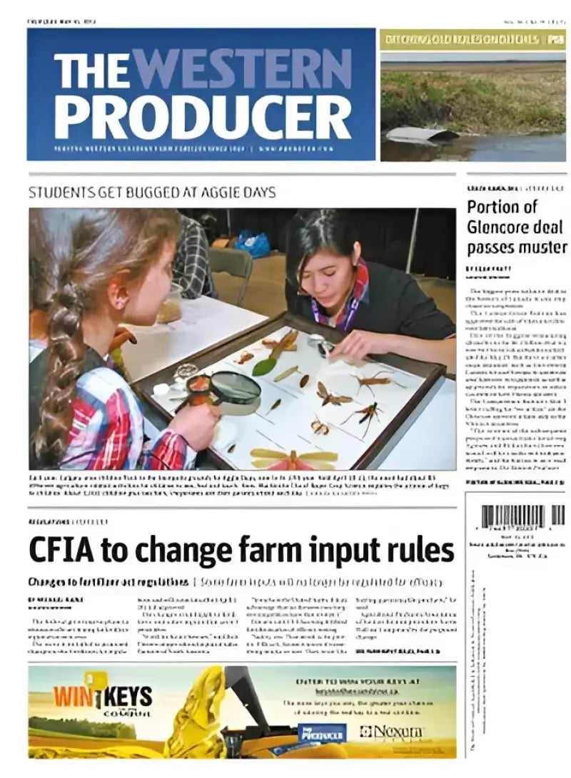 Newspaper article titled "STUDENTS GET BUGGED AT AGGIE DAYS" featuring children examining insects, with additional sections discussing topics like regulation changes by CFIA and a part of Glencore deal passing muster.