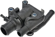 Black plastic Dorman T Housing for proper engine temperature and cooling system