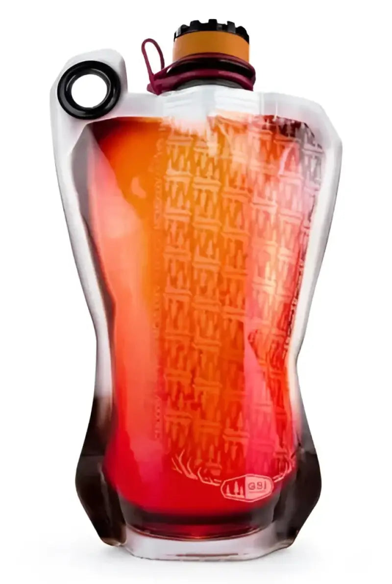Orange and red liquid in clear flexible flask for G.S.I. Sports Highland truck parts