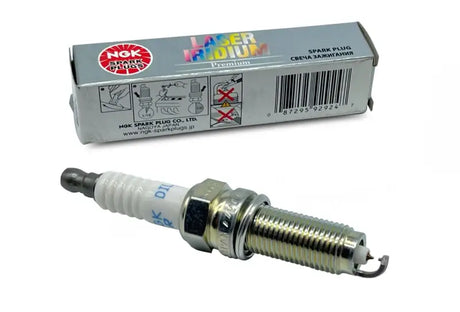 NGK DILZKR7A11G spark plug with packaging for auto repairs
