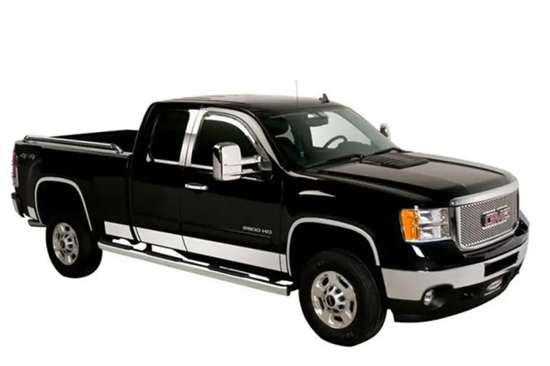 Black Chevrolet Silverado LD crew cab with chrome accents and side steps