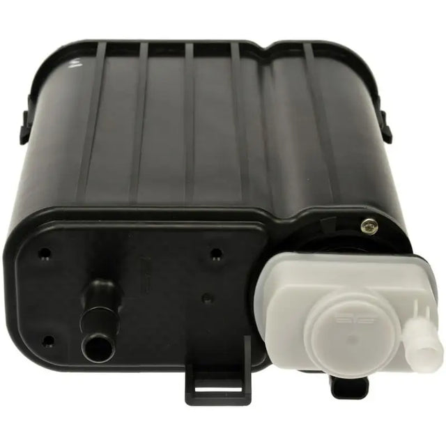 Black plastic Dorman Evap Canister with white reservoir for automotive repairs