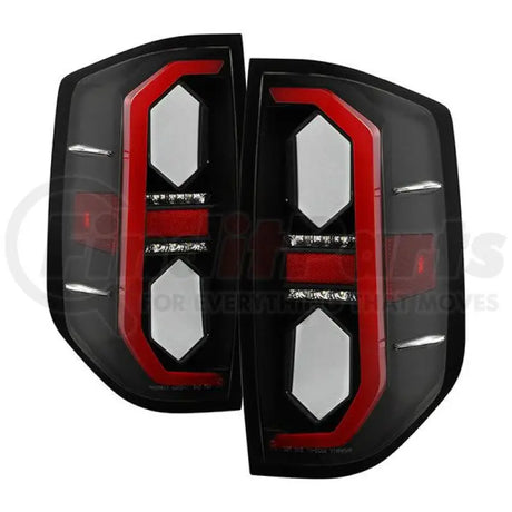 Black aftermarket Toyota Tundra tail lights with LED bars for improved visibility and custom fit