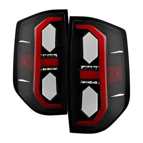 Black LED Toyota Tundra tail lights with red and white accents for improved visibility