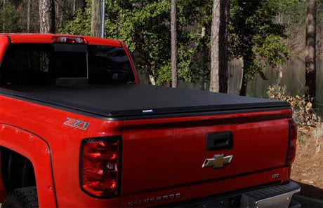 Lund 04-08 Ford F-150 Styleside (5.5ft. Bed) Hard Fold Tonneau Cover - Black 
