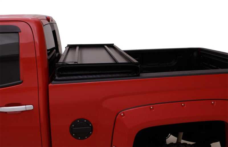 Lund 04-08 Ford F-150 Styleside (5.5ft. Bed) Hard Fold Tonneau Cover - Black 