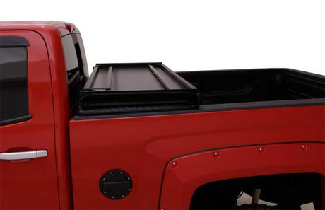 Lund 04-08 Ford F-150 Styleside (5.5ft. Bed) Hard Fold Tonneau Cover - Black 
