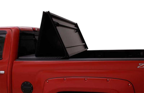 Lund 04-08 Ford F-150 Styleside (5.5ft. Bed) Hard Fold Tonneau Cover - Black 