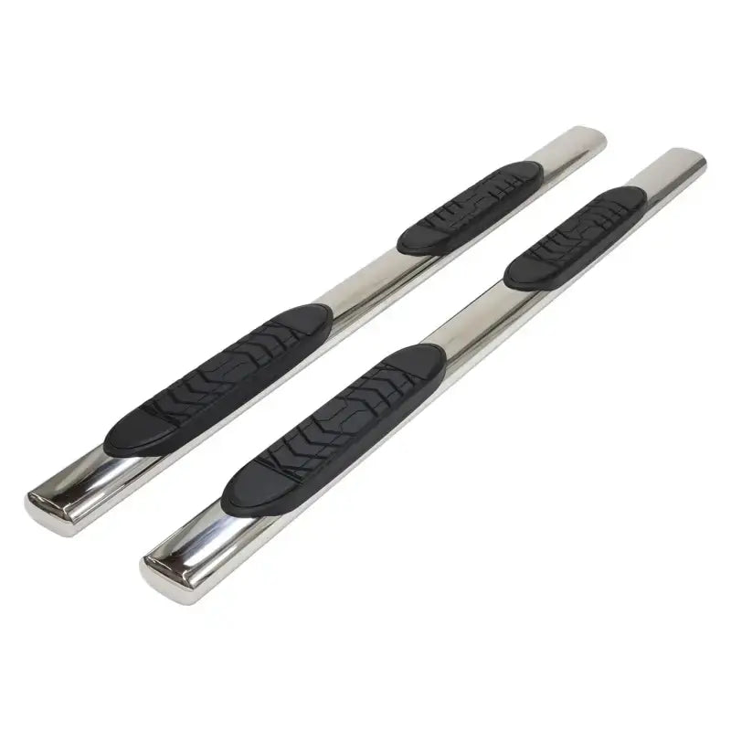 Chrome running boards with black step pads.