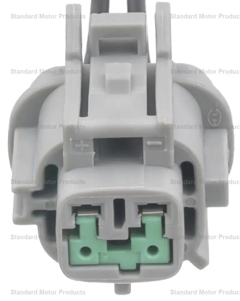 Gray ABS wheel speed sensor connector with green terminals for speed sensor replacement