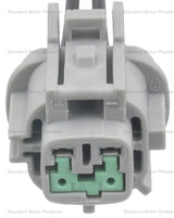 Gray ABS wheel speed sensor connector with green terminals for speed sensor replacement