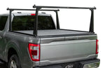 Silver Ford F-150 with black Adarac Aluminum Pro Series truck rack and tonneau cover