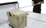 Tan cooler with metal handle on Access Accessories EZ-Retriever II cargo reaching tool in truck bed