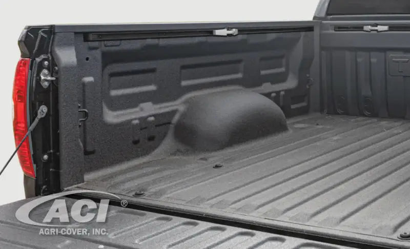 Toyota Tundra bed with black spray-in liner and Access LOMAX tri-fold cover