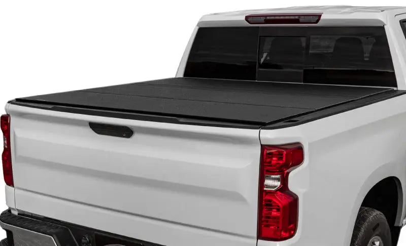 White Toyota Tundra with black tri-fold cover for 6ft 6in bed easy to install