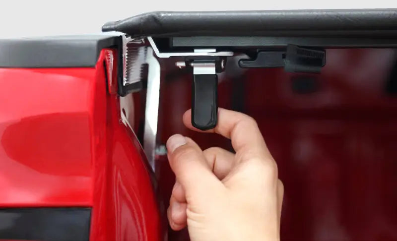 Close-up of clasp installation for Access Tonnosport 2022 Hyundai Santa Cruz Full Size 4ft Bed Roll-Up Cover.