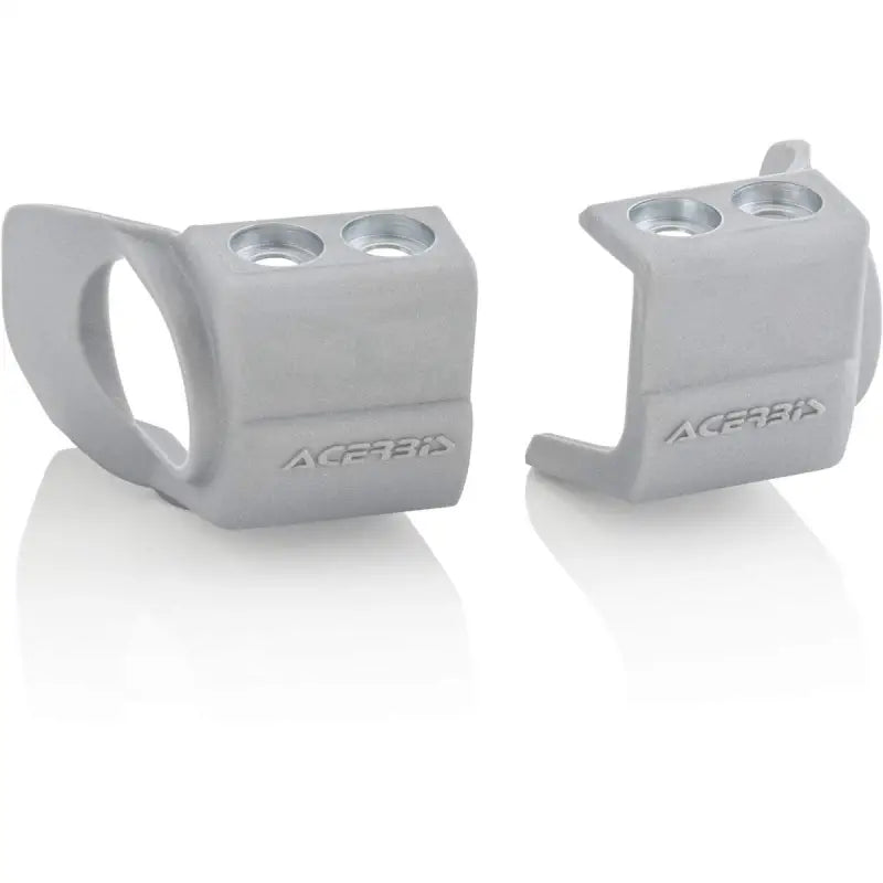 Two gray Acerbis fork shoe protectors for Honda CRF and Kawasaki KX bikes