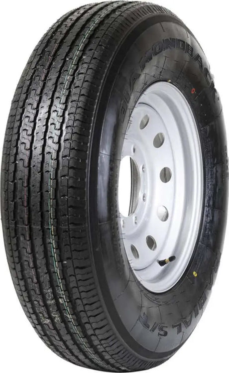 Taskmaster St235/80R16 10 Ply Diamondback trailer tire with white wheel, high-strength construction for heavy-duty use, featuring Diamondback tread for enhanced traction and durability.